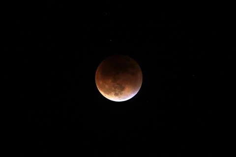 Partial after total lunar eclipse 2015 Stock Photos