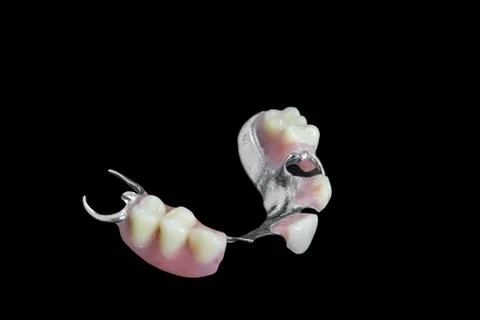 Partial denture on black background 库存照片