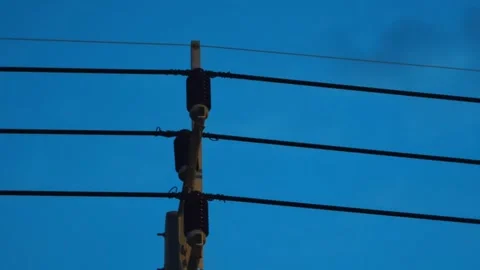 Partial discharge spark on high voltage overhead power line cover tie wire. Stock Footage 338175244
