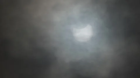 Partial Eclipse With Moon Covering Sun, Rhyl, Wales March 29th 2025 Stock Footage 305341924