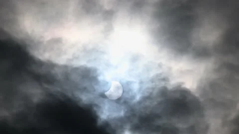 Partial eclipse of the Sun. Moon in front of the sun. Stock Footage 219885797