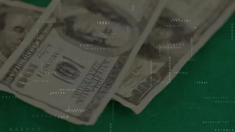 Partial hand placing $100 bills, fanning, zooming in, chips forming stake on Stock Footage 329700764