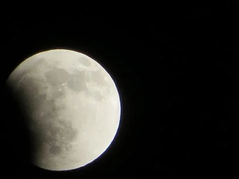 Partial Lunar Eclipse Big Moon Details in Clear Dark Night Sky Stock Photos