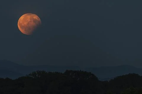 Partial lunar eclipse, the earth's shadow is projected on the moon. Bas-Rhin, Fotos Stock