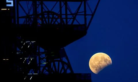 A partial lunar eclipse in Katowice, Poland - 07 Aug 2017 Stock Photos