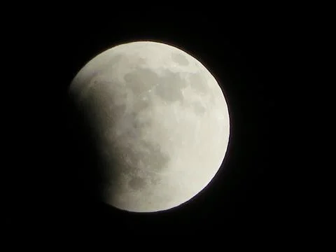 Partial Lunar Eclipse Moon Details in Clear Dark Night Sky Stock Photos