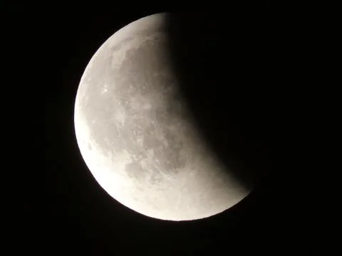 Partial Lunar Eclipse  Moon in Partial Eclipse  Half Shadowed Moon Stock Photos