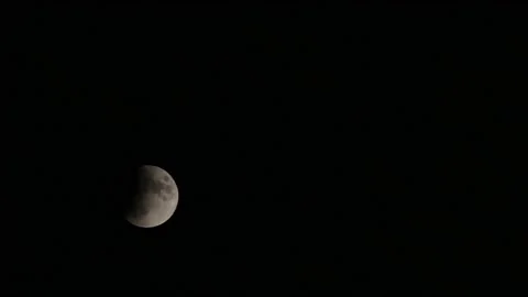 A partial lunar eclipse timelapse  Stock Footage 147587080
