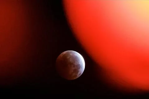 Partial lunar eclipse viewed in Seville, Mairena Del Aljarafe, Spain - 28 Aug 20 Stock Photos