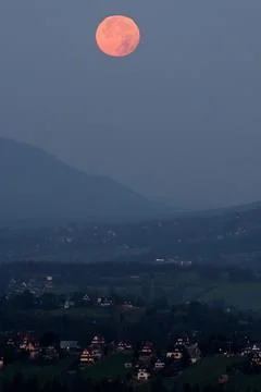 Partial lunar eclipse visible from Zgorzelisko Glade, Polana Zgorzelisko, Poland Stock Photos