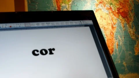 Partial map of the world with Coronavirus word on PC Stock Footage 126167191