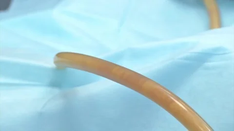 Partial removal of fat and mucous tissues. Fat liquid in the bottle from Video stock 83202729