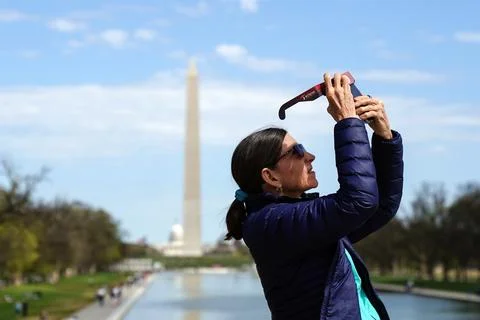 Partial solar eclipse (89%) in Washington, DC, Usa - 08 Apr 2024 Stock Photos