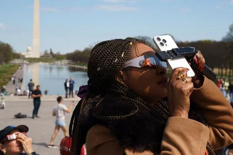 Partial solar eclipse (89%) in Washington, DC, Usa - 08 Apr 2024 Stock Photos
