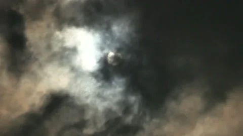 Partial solar eclipse behind the clouds. From the Czech Republic 12.06.2021 Stock Footage 155450175