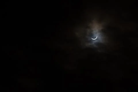 Partial Solar Eclipse on a Cloudy Day in Kristiansand Norway Stock Photos