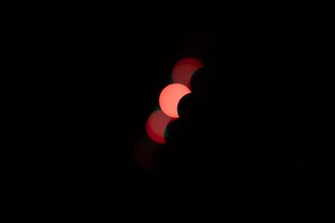 Partial solar eclipse with colorful flares in the sky Fotos Stock