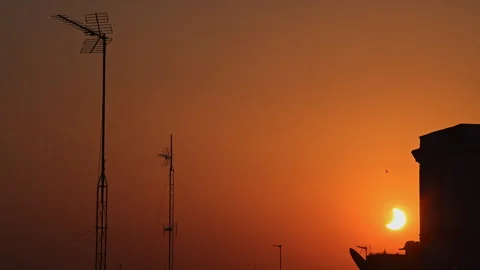 Partial Solar Eclipse Crescent Madrid Skyline Rooftop Antennas Satellite Dish Vidéo 347494607