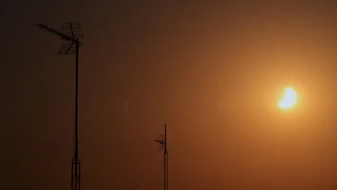 Partial Solar Eclipse Diamond Ring Crescent Central Madrid Rooftop TV Antennas Stock Footage 347672913