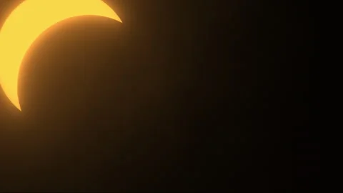 Partial Solar Eclipse Entering Frame in Time-Lapse Stock Footage 273011297