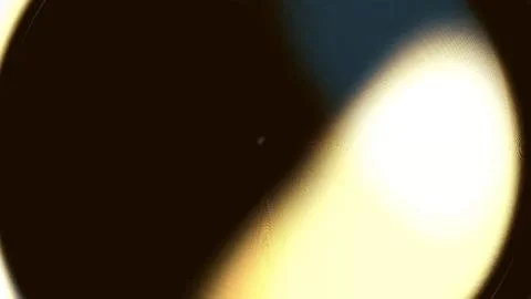 Partial solar eclipse with golden crescent glow against dark sky 스톡 일러스트