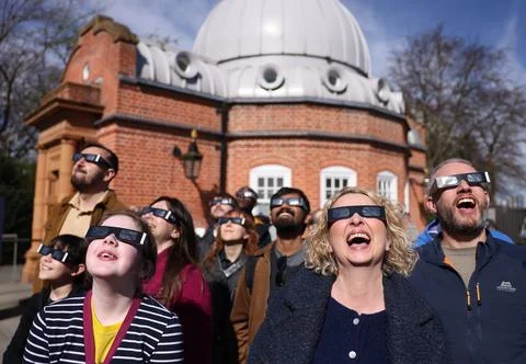Partial solar eclipse from Greenwich Observatory in London, United Kingdom - 29  Stock Photos