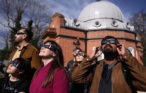 Partial solar eclipse from Greenwich Observatory in London, United Kingdom - 29  Stock Photos