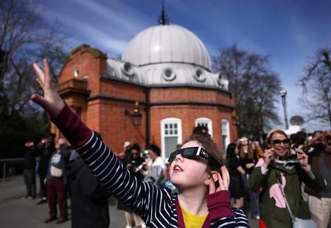 Partial solar eclipse from Greenwich Observatory in London, United Kingdom - 29  Stock Photos