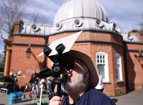 Partial solar eclipse from Greenwich Observatory in London, United Kingdom - 29  Stock Photos