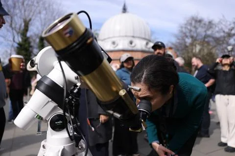 Partial solar eclipse from Greenwich Observatory in London, United Kingdom - 29  Stock Photos