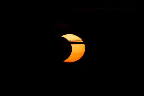 The partial solar eclipse of June 10th, 2021 - The sun obscured by the moon,  Fotos Stock