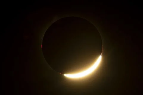 Partial Solar Eclipse with the Moon Crossing the Sun Stock Photos