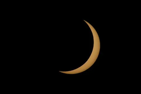 Partial Solar Eclipse with the Moon Crossing the Sun Stock Photos