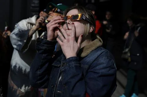 Partial solar eclipse in New York City, USA - 08 Apr 2024 Stock Photos