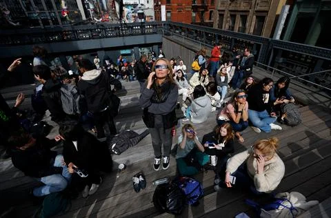 Partial solar eclipse in New York City, USA - 08 Apr 2024 Stock Photos