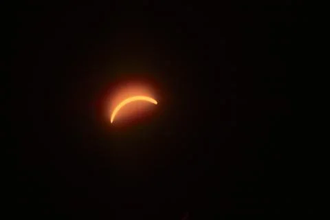 Partial Solar Eclipse Over Indiana - Celestial Crescents Fotos de archivo