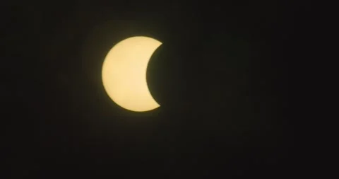 Partial Solar Eclipse with Passing Clouds 02 Stock Footage 342122282
