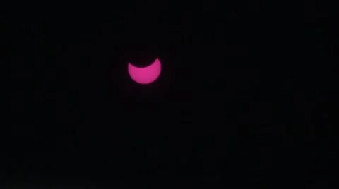 Partial solar Eclipse red filter Stock Footage 48174442