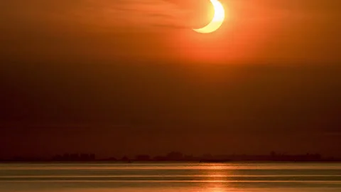 Partial Solar Eclipse Rise Stock Footage 155585792