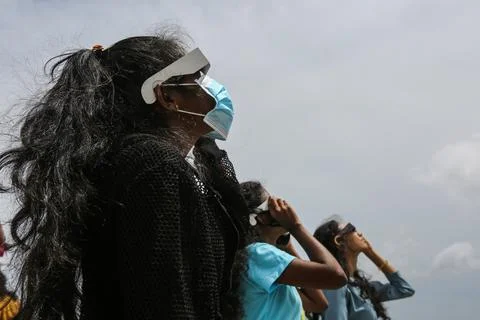 Partial solar eclipse seen from Colombo, Sri Lanka - 21 Jun 2020 Stock Photos