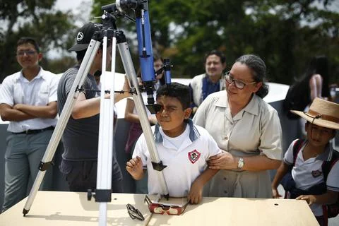 Partial solar eclipse seen in El Salvador, Soyapango - 08 Apr 2024 Fotos Stock