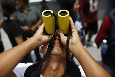 Partial solar eclipse seen in El Salvador, Soyapango - 08 Apr 2024 Stock Photos