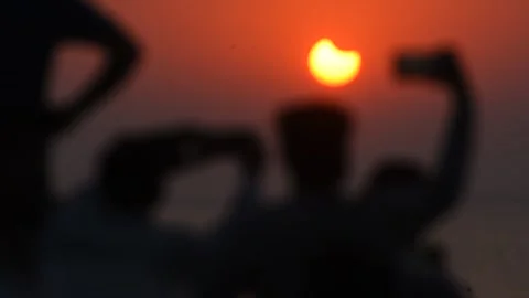 Partial Solar Eclipse Seen In India Stock Footage 220093413