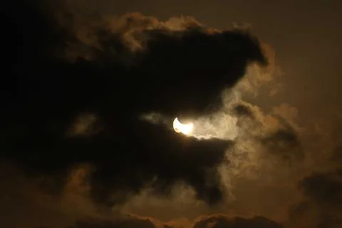 Partial solar eclipse seen from Karachi, Pakistan - 25 Oct 2022 Stock Photos