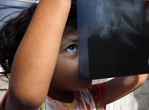 Partial solar eclipse seen from Sanaa, Yemen - 21 Jun 2020 Stock Photos