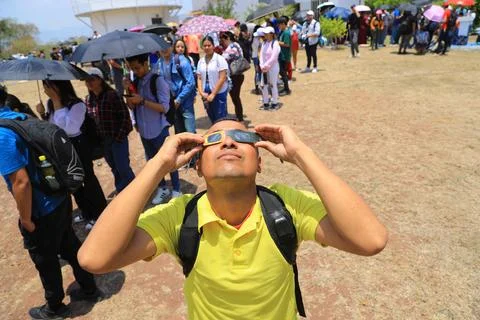 Partial solar eclipse seen from Tegucigalpa, Honduras - 08 Apr 2024 Stock Photos