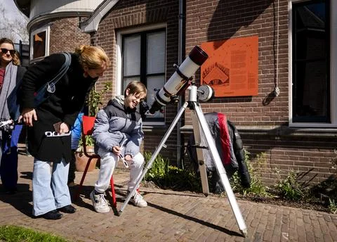 Partial solar eclipse from Sonnenborgh observatory in Utrecht, Netherlands - 29  Stock Photos