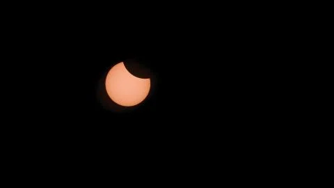 Partial Solar Eclipse Starts Stock Photos