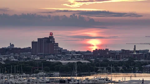 Partial Solar Eclipse At Sunrise Over Baltimore Time-Lapse Stock Footage 155447697