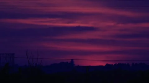 Partial solar eclipse at sunset over Rome skyline with Gasometer silhouette.. Stock Footage 342286265